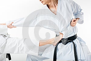 cropped image of karate fighters training