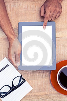 Cropped image of person using on digital tablet