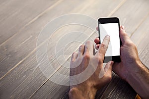 Cropped image of person using smartphone