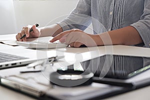 Cropped image of professional businesswoman working at her office via laptop young female manager using portable computer device