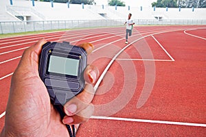 Cropped image of runner on competitive running