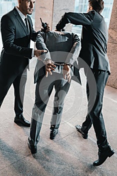 Cropped image of security guards