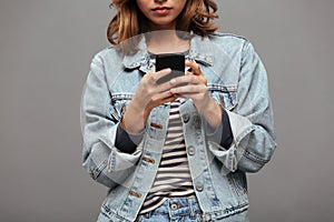 Cropped image of a serious young teenage girl