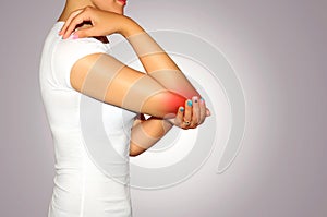 Cropped image woman with joint inflammation. Woman suffering fro photo