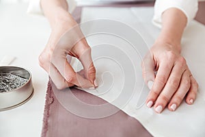 Cropped image of woman making patterns