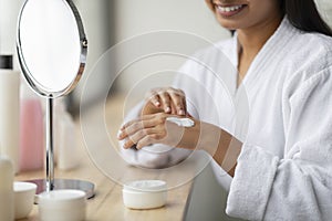 Cropped of indian woman enjoying her morning body care routine