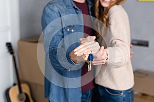 Cropped of man and woman holding