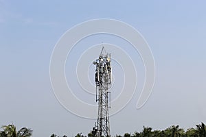 Cropped and partial display of mobile communication tower with selective focus on daytime.