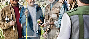 Cropped photo of family of fisherman