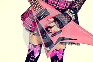 Cropped photo of female punk teen rocker