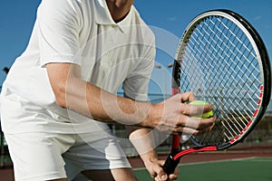 Cropped photo of Man Playing Tennis