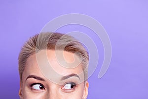 Cropped photo of tricky cunning woman short haircut looking empty space isolated purple color background