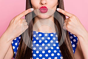 Cropped photo of young woman point fingers pouted lips injection fillers cosmetology isolated over pink color background