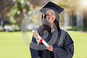 .Cropped portrait of an attractive young female student celebrating on graduation day.