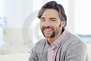 Keeping it casual. Cropped portrait of a handsome man smiling at the camera.