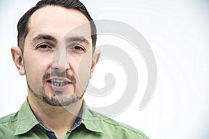 Cropped portrait of skeptical guy, looking suspicious isolated on white background.