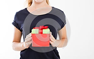 Cropped portrait of a smiling girl, woman holding stack of gift boxes isolated on white background. Holiday concept. Mock up, temp