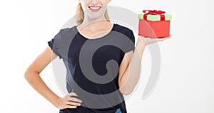 Cropped portrait of a smiling girl, woman holding stack of gift boxes isolated on white background. Holiday concept. Mock up, temp