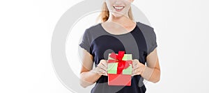 Cropped portrait of a smiling girl, woman holding stack of gift boxes isolated on white background. Holiday concept. Mock up, temp