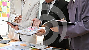 Cropped, Professional businesspeople are working, reviewing financial report together