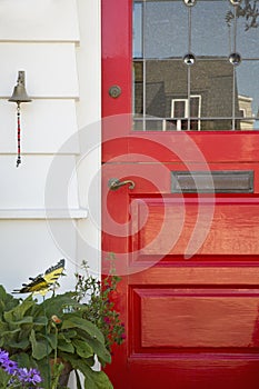 Cropped red front door of a home