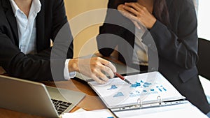 Cropped shot of financial team discuss and analyse business financial data together