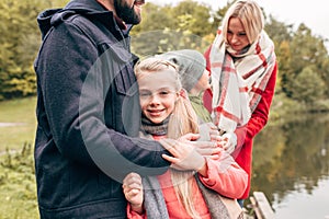 cropped shot of happy young family spending time