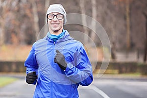 Cropped shot of a happy young man running.
