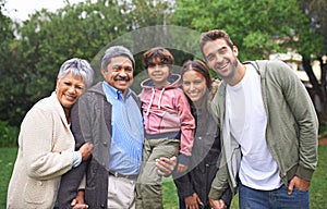 Family is a little world created by love. Cropped shot of a multi-generational family. photo