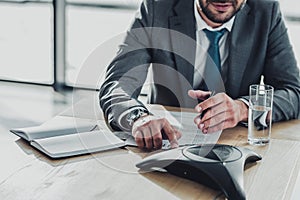 cropped shot of smiling businessman