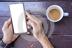 Cropped shot top view of businessman hands using smartphone mockup at the office desk.