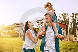 You can never have too much family time. Cropped shot of a young family spending time together outdoors.