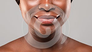 Cropped Shot Of Young Smiling African American Woman's Face