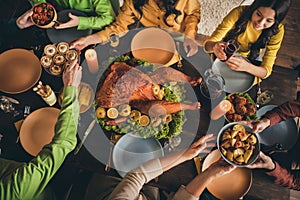 Cropped top above high angle view of nice attractive friends friendship family parents grandparents sitting around