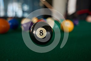 Cropped view on billiard balls on pool table
