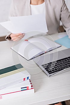 cropped view of businesswoman working in