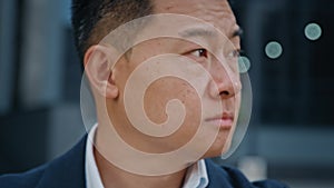 Cropped view close up Asian middle-aged businessman in formal business suit man male boss company CEO check time