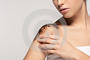 Cropped view of girl applying coffee