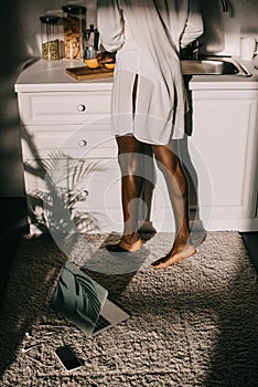 Cropped view of legs of african american woman