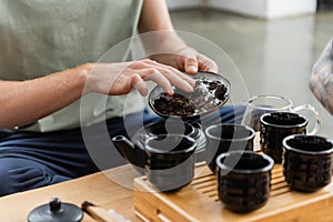 cropped view of man adding puer