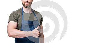 cropped view of man in apron  on white background. thumb up