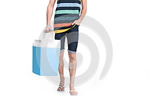 cropped view of man holding cooler box,