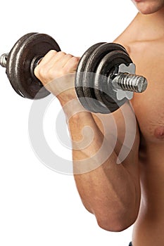 Cropped view of a muscular man lifting weights