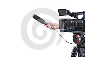 cropped view of video camera and female hand with microphone,