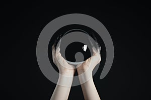 Cropped view of witch holding crystal