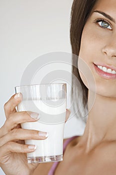 Cropped Woman Holding Glass Of Milk