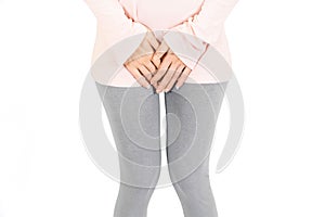 Cropped of woman put her hand on the genitalia area, Penis pain or Itching urinary Health-care concept on white background