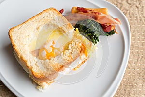 Croque monsieur or egg ham cheese sandwich with garnish