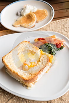 Croque monsieur or egg ham cheese sandwich with garnish