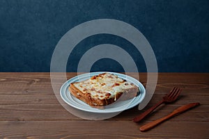 croque monsieur ham cheese sandwich on plate isolated on table